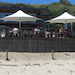 White elephant cafe wooden deck and sun umberellas